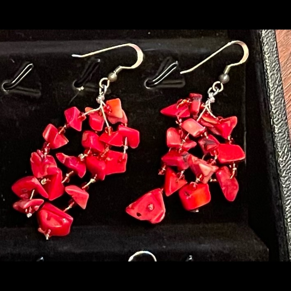 Sterling silver and cinnabar dangle earrings.